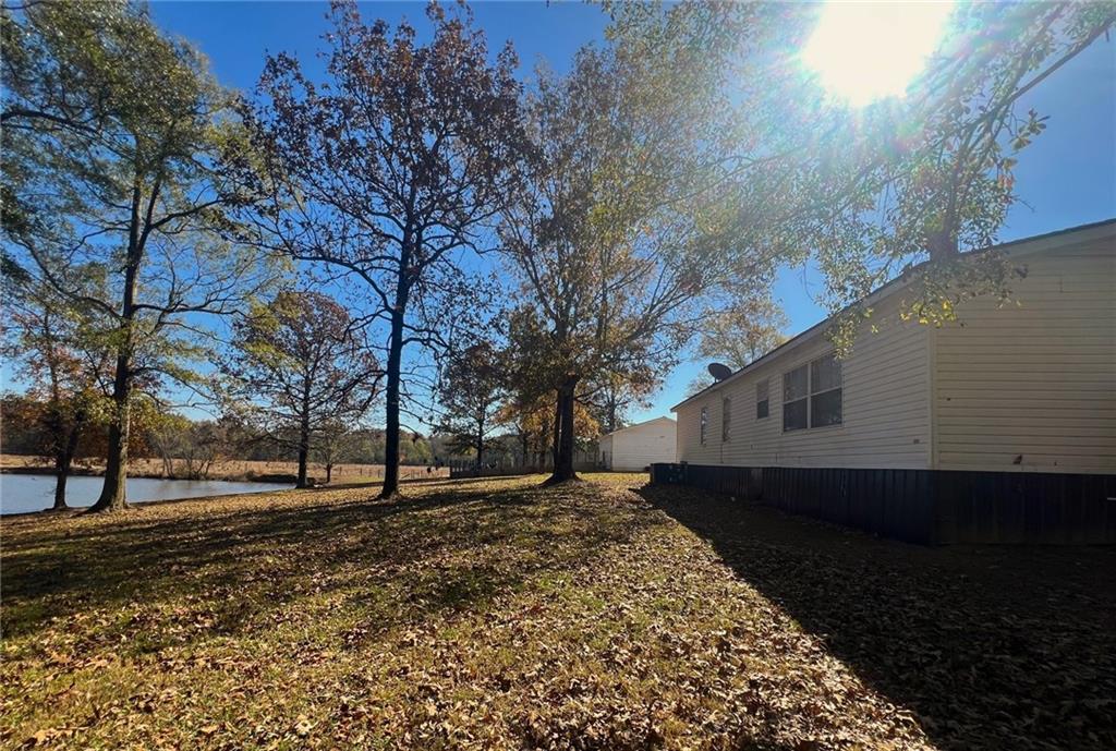 486 County Line Road Resaca, GA 30735 - Photo 37 of 66 a view of a yard with a house