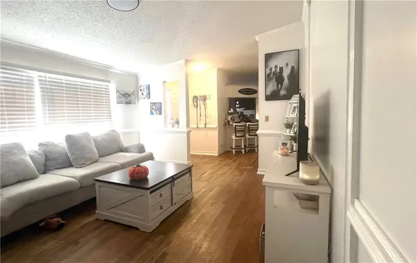 a view of a balcony with two chairs