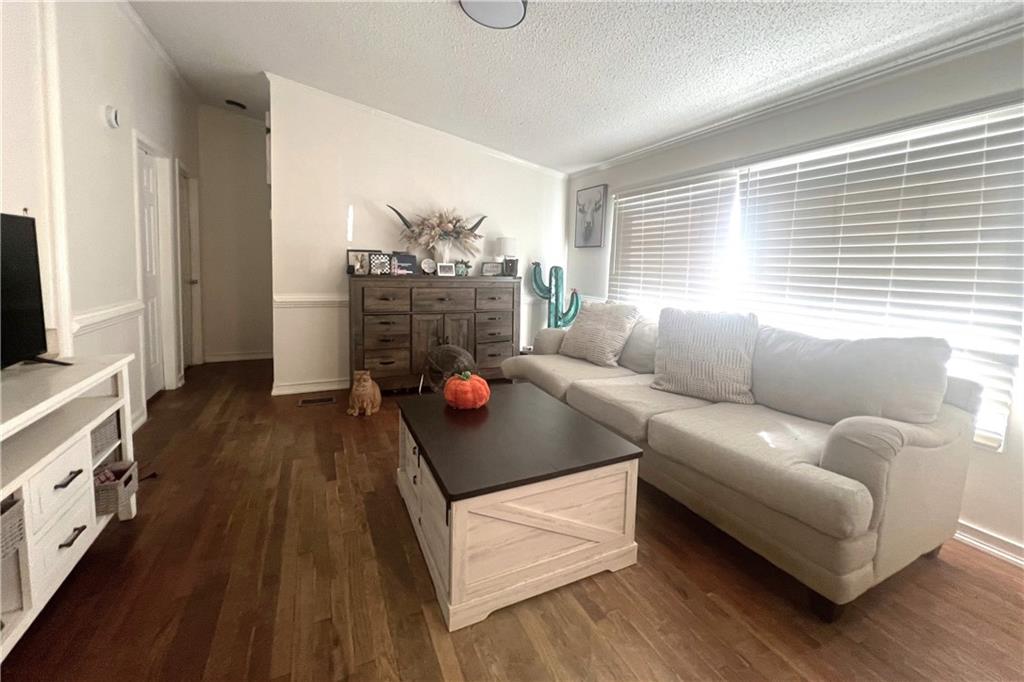 486 County Line Road Resaca, GA 30735 - Photo 45 of 66 a living room with furniture and a flat screen tv