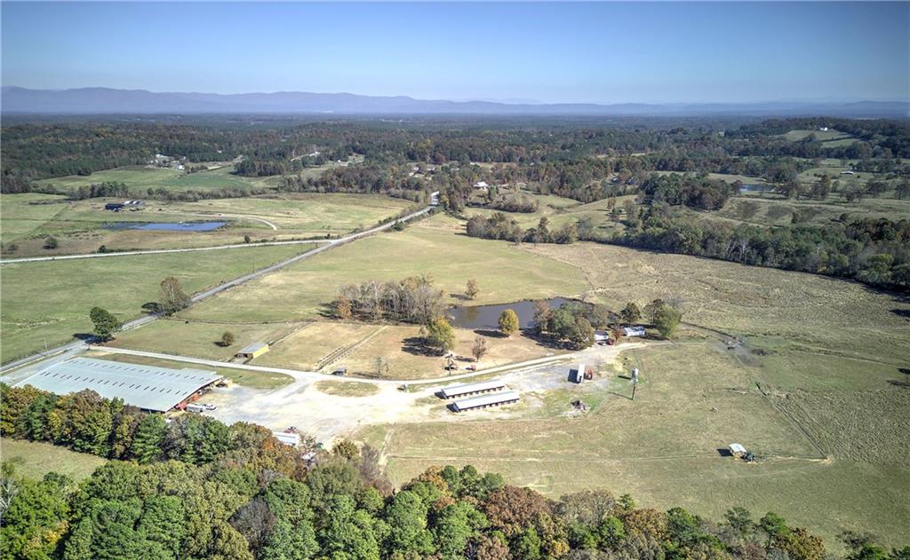 486 County Line Road Resaca, GA 30735 - Photo 5 of 66 an aerial view of a houses