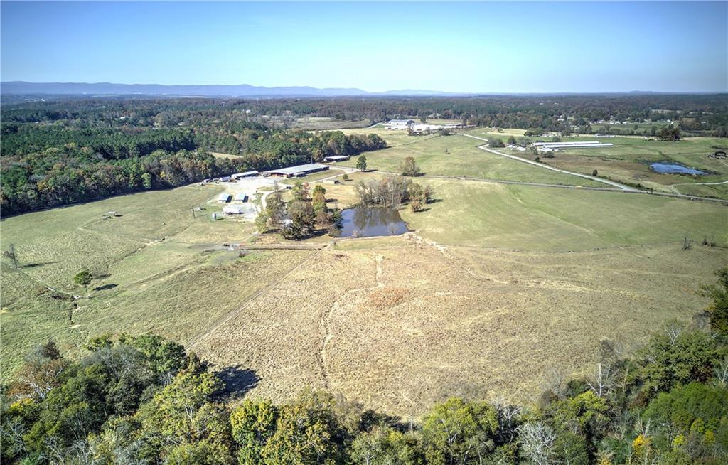 486 County Line Road Resaca, GA 30735 - Photo 6 of 66 a view of a lake with mountains in the background