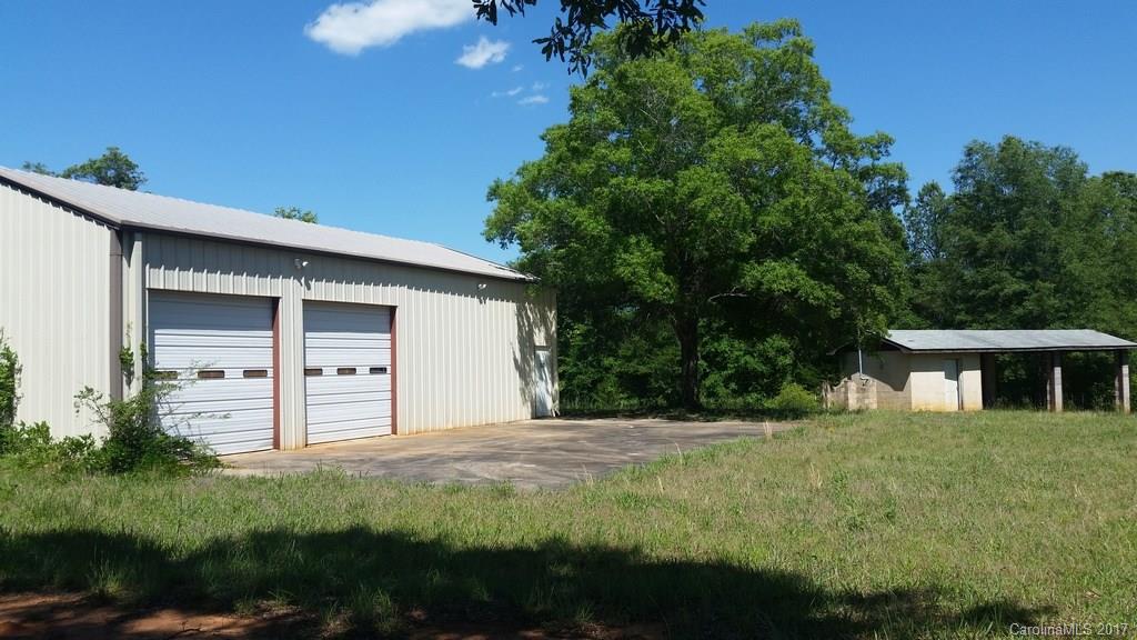 3634 Old Hickory Road Lancaster, SC 29720 - Photo 10 of 10 a view of a house with backyard and trees