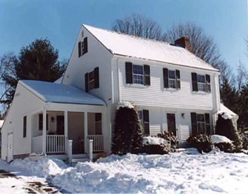 7 Windemere Road Wellesley, MA 02481 - Photo 1 of 1 a front view of a house with a yard and parking space
