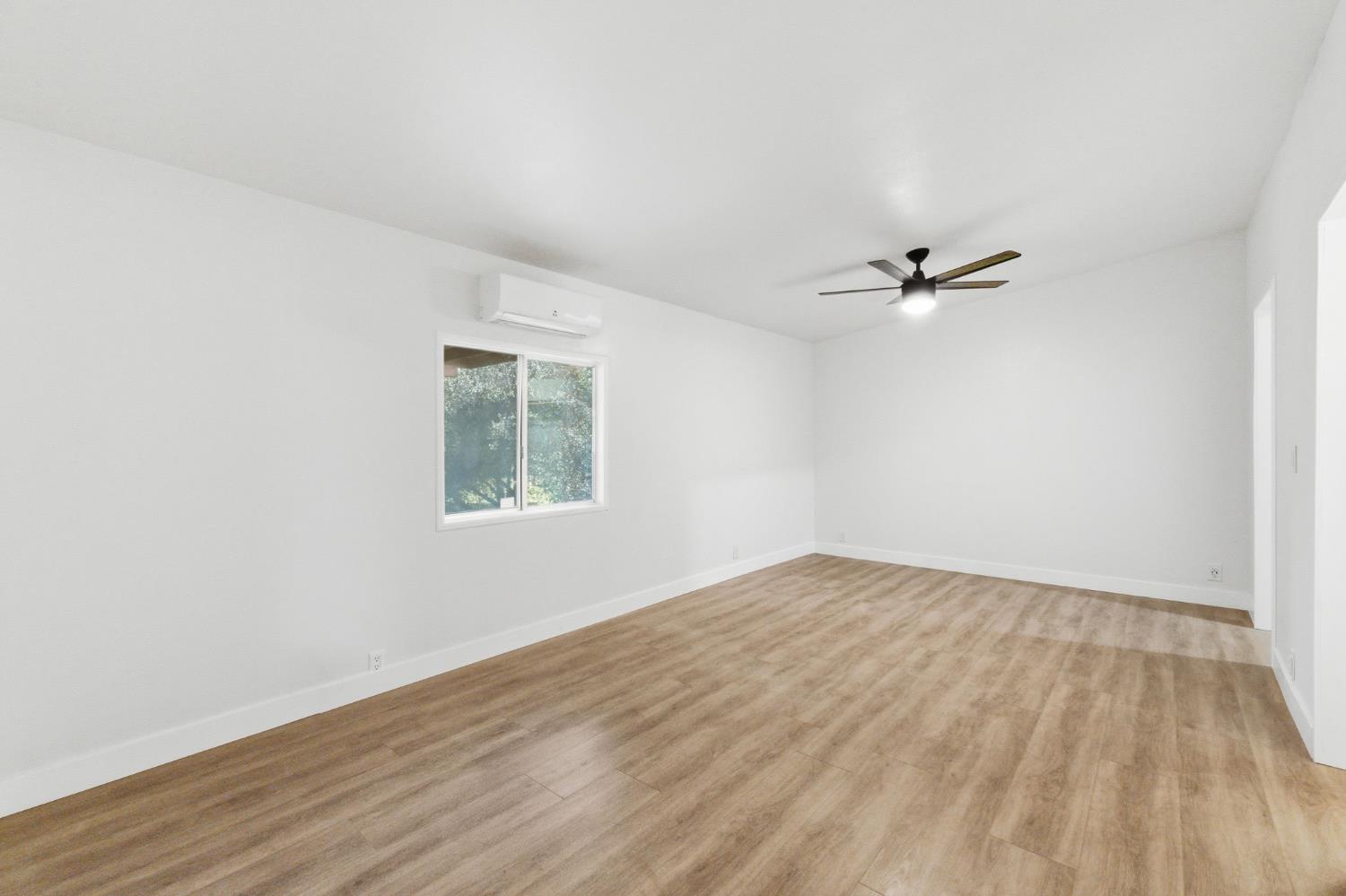 40089 John West Road Oakhurst, CA 93644 - Photo 23 of 59 a view of an empty room with a window