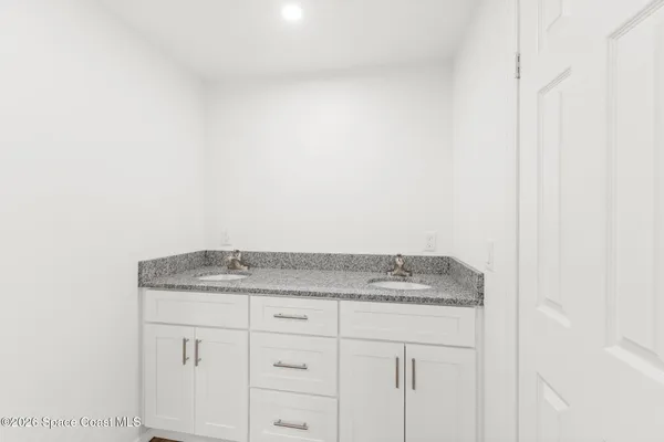 a bathroom with a bathtub and toilet