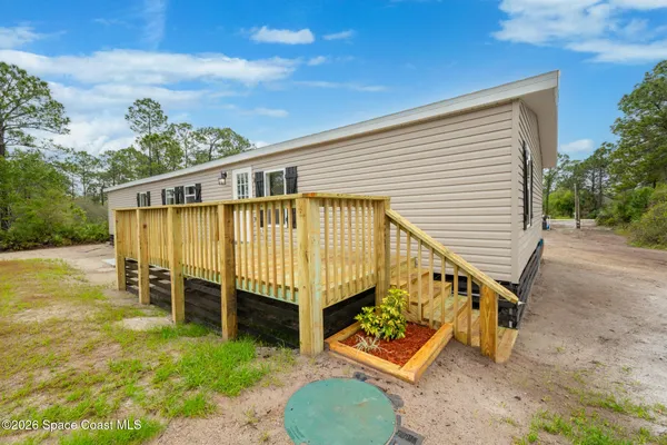 a view of a house with roof deck