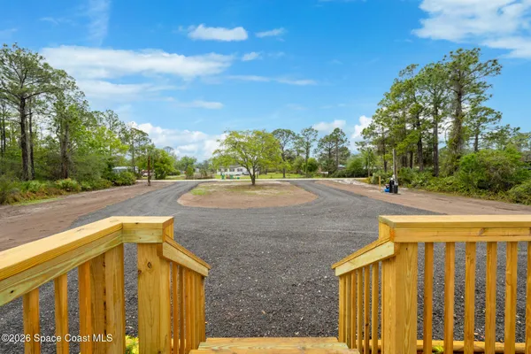 a view of yard with outdoor seating