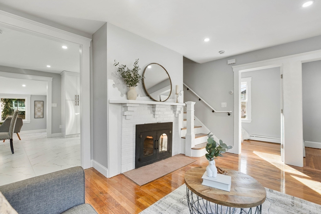29 Lake View Place Lynn, MA 01904 - Photo 15 of 35 a living room with furniture and a fireplace
