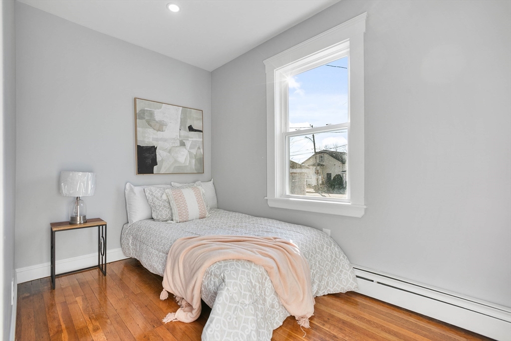 29 Lake View Place Lynn, MA 01904 - Photo 17 of 35 a bedroom with a bed and a window