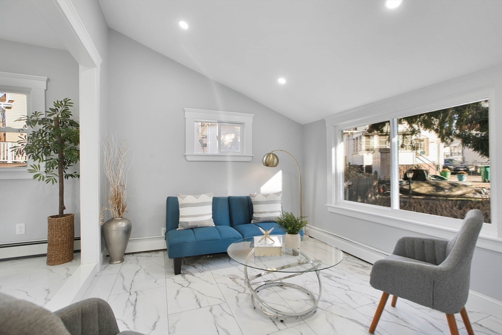 29 Lake View Place Lynn, MA 01904 - Photo 23 of 35 a living room with furniture and a large window