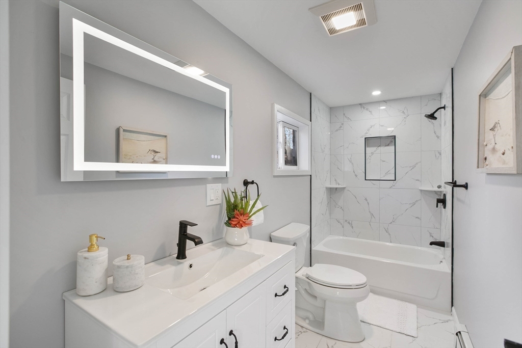 29 Lake View Place Lynn, MA 01904 - Photo 10 of 35 a bathroom with a sink toilet and shower