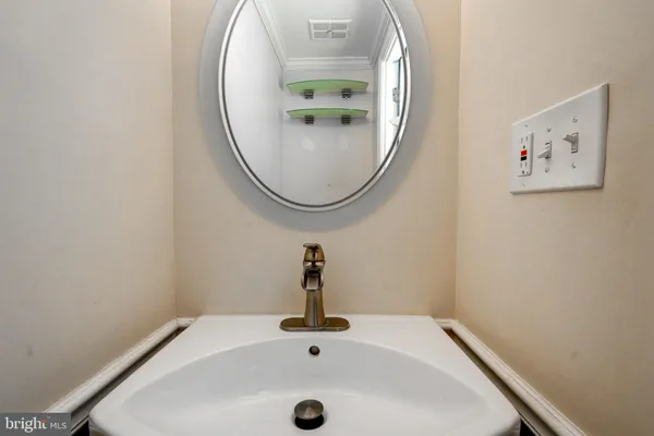 a kitchen with stainless steel appliances granite countertop a refrigerator sink and stove