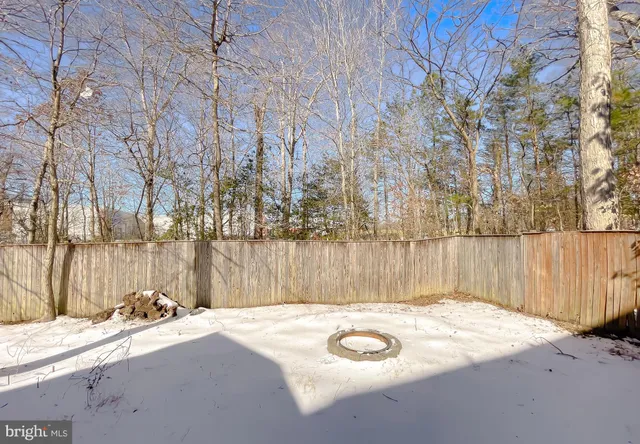 a view of backyard of a house