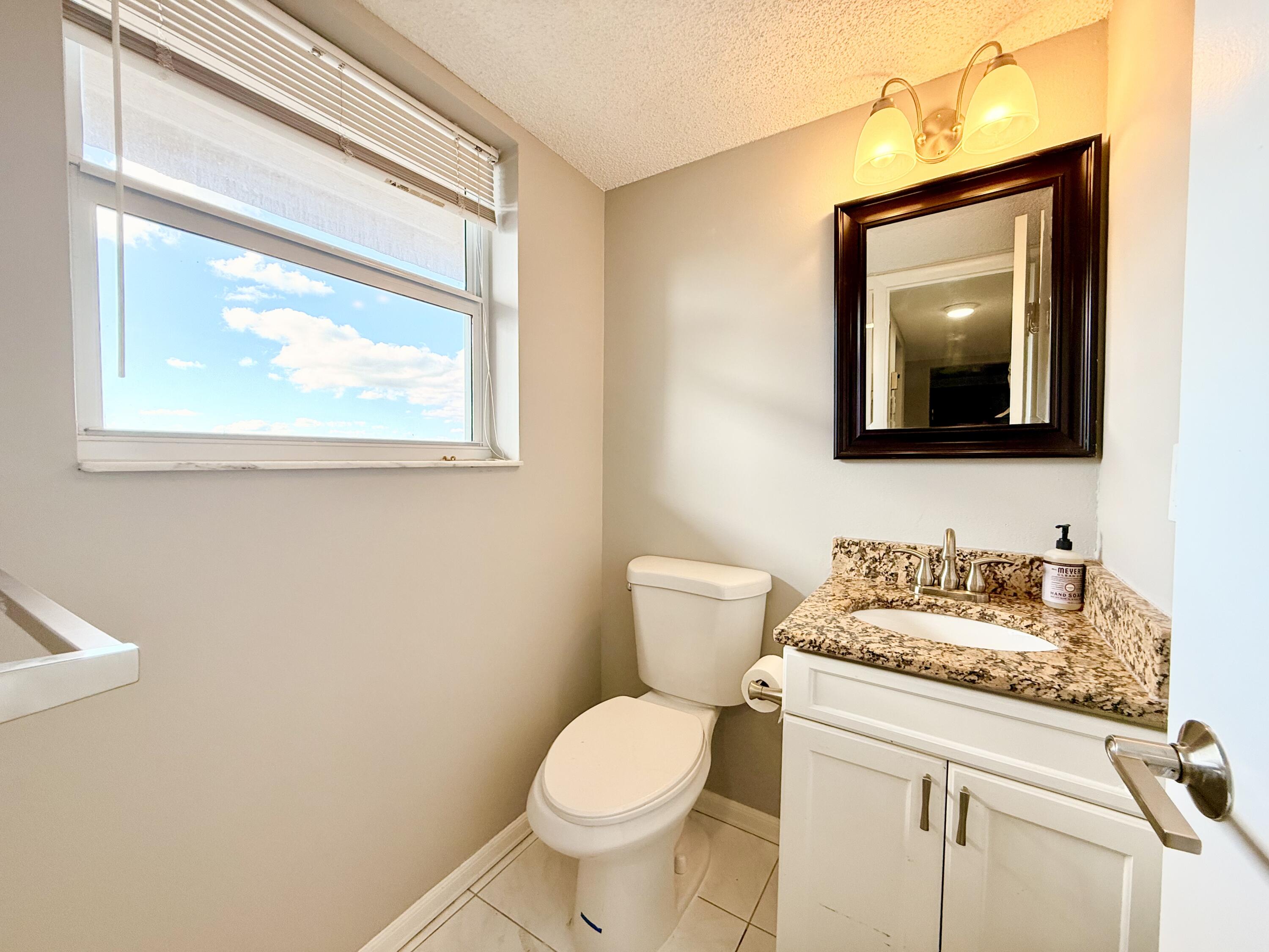 2929 South Ocean Boulevard, Unit 406 Boca Raton, FL 33432 - Photo 16 of 16 half bathroom