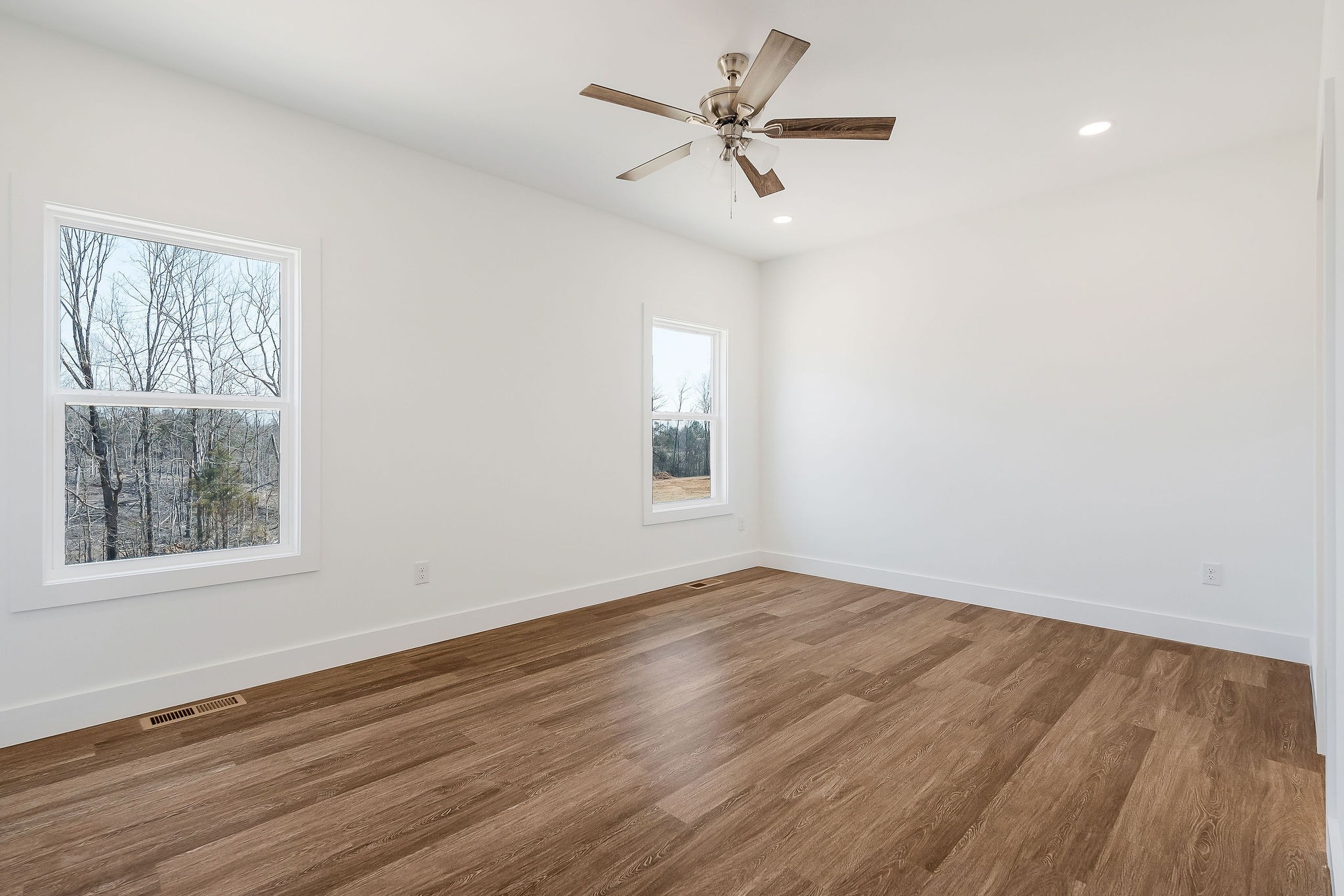 194 Johnson Chapel Road Sparta, TN 38583 - Photo 18 of 35 wooden floor in an empty room with a window