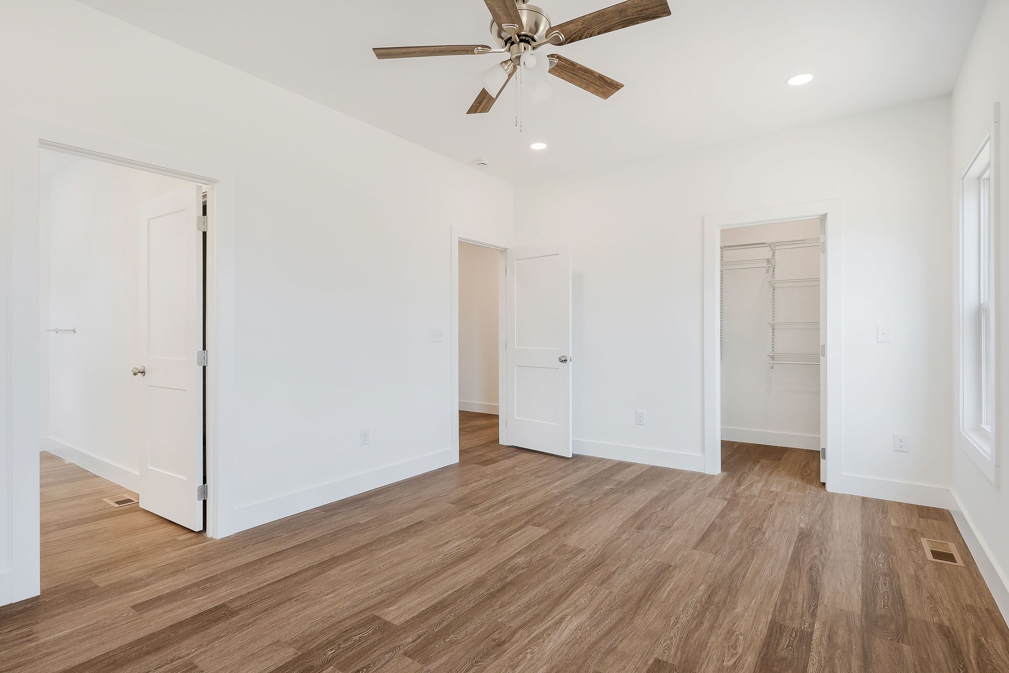 194 Johnson Chapel Road Sparta, TN 38583 - Photo 19 of 35 a view of an empty room with wooden floor