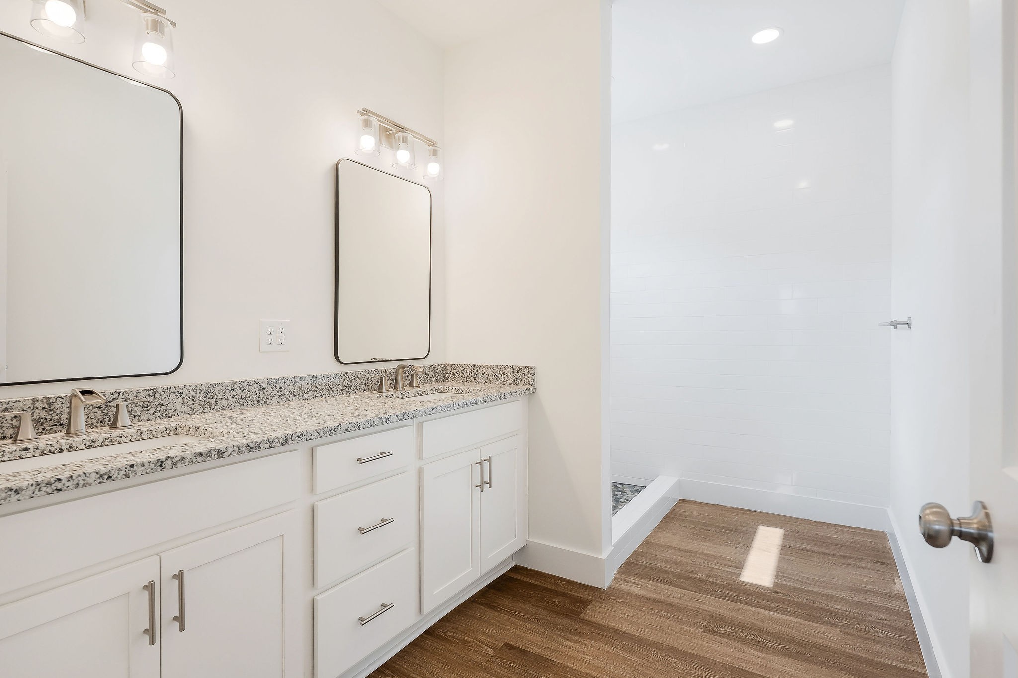 194 Johnson Chapel Road Sparta, TN 38583 - Photo 21 of 35 a bathroom with a granite countertop double vanity sink and mirror