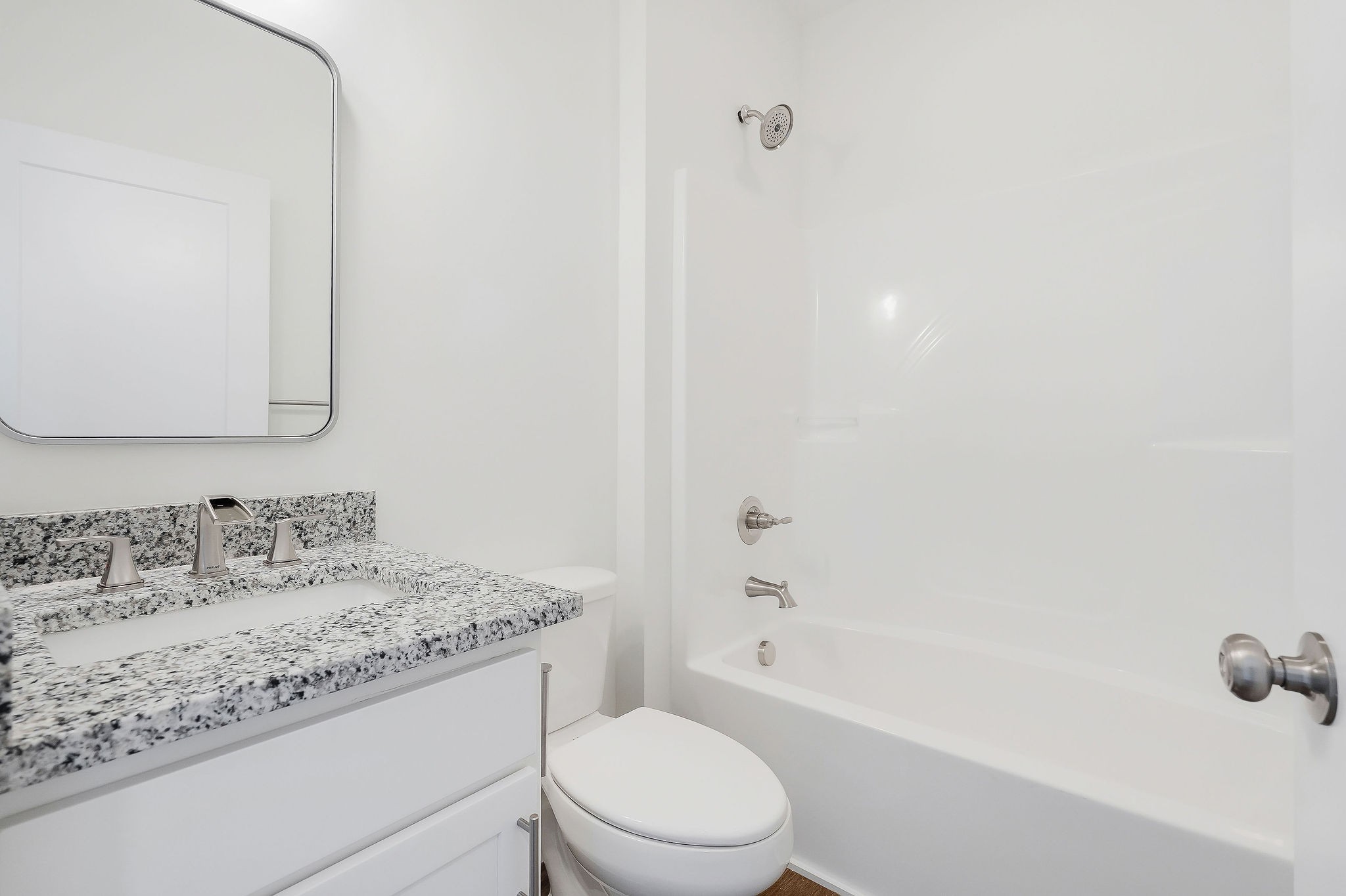 194 Johnson Chapel Road Sparta, TN 38583 - Photo 27 of 35 a bathroom with a granite countertop sink toilet and shower