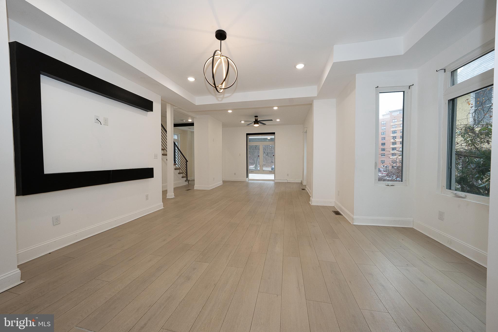 622 Spring Avenue Elkins Park, PA 19027 - Photo 14 of 65 a view of empty room with wooden floor and fan
