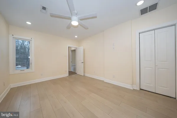 a white bath tub sitting in a bathroom