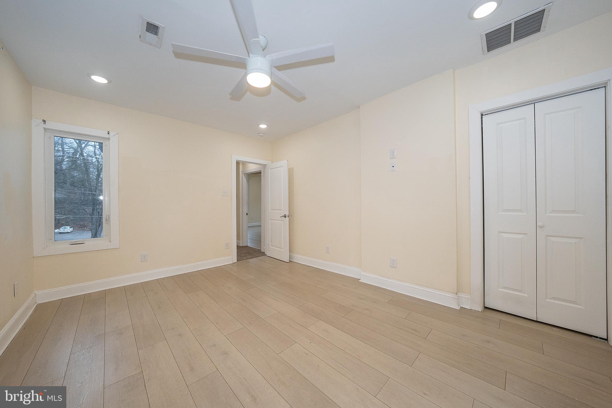622 Spring Avenue Elkins Park, PA 19027 - Photo 30 of 65 wooden floor in an empty room with a window