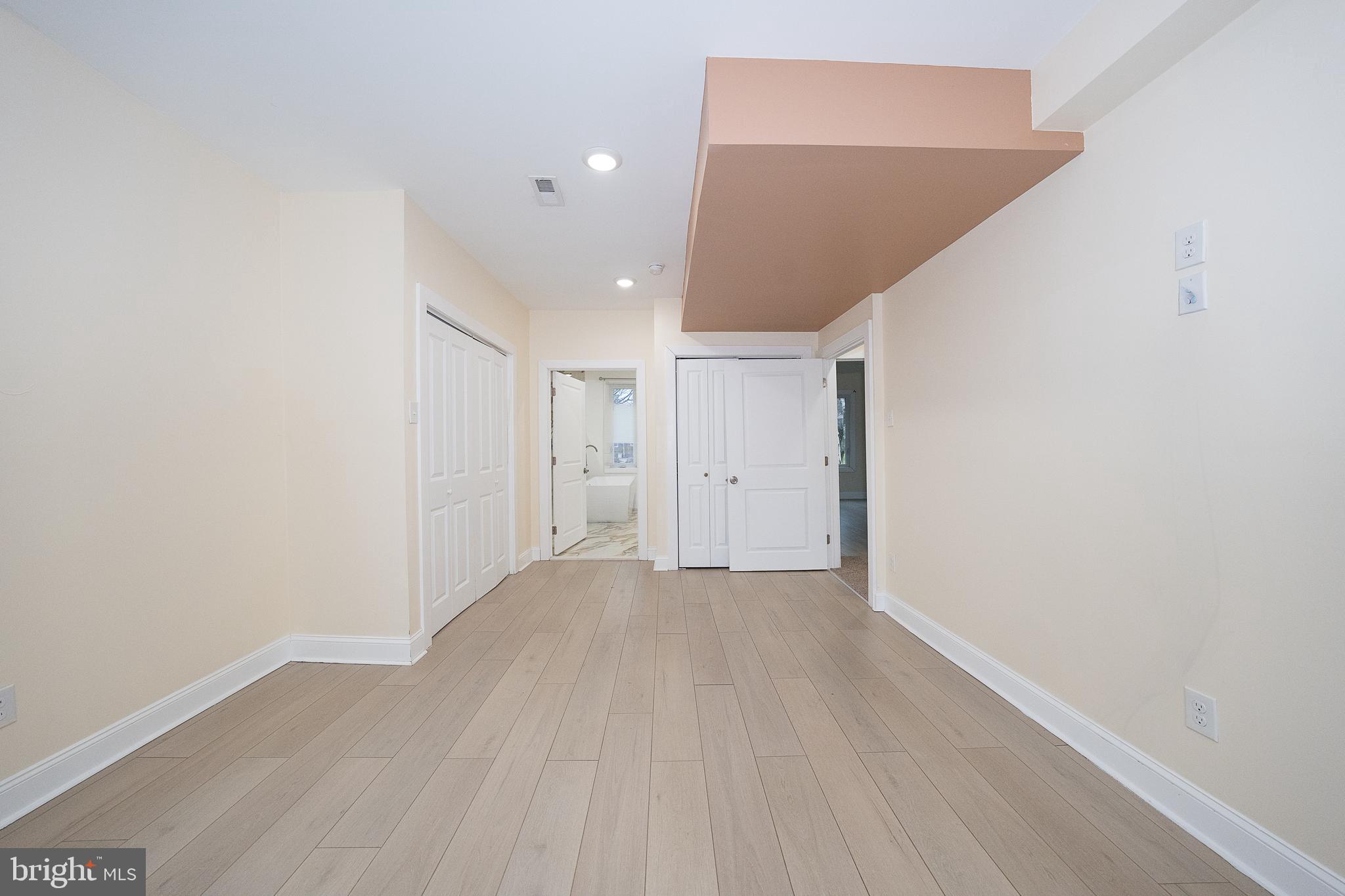 622 Spring Avenue Elkins Park, PA 19027 - Photo 33 of 65 a view of an empty room with wooden floor