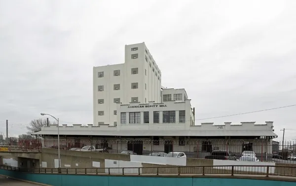 a view of a large building with a beach