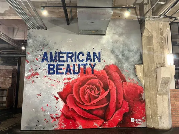 a view of a wooden door with a street