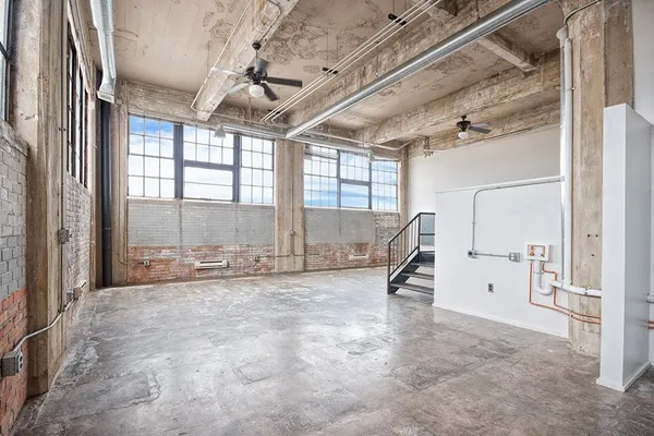 a view of a room with stairs