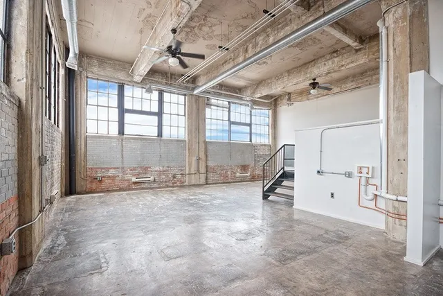 a view of a room with stairs