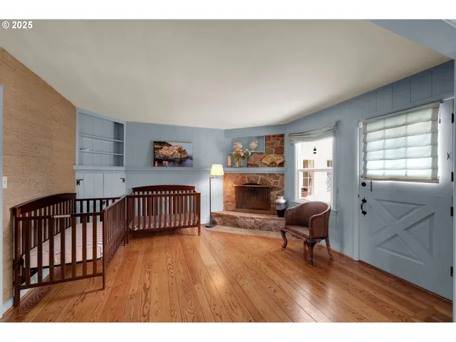 a workspace with furniture hardwood and a window