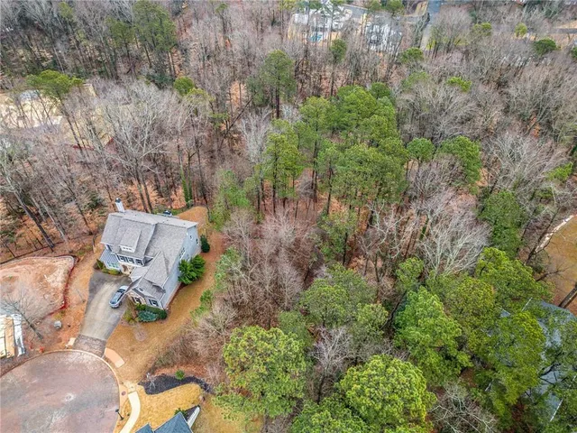 an aerial view of residential house with outdoor space