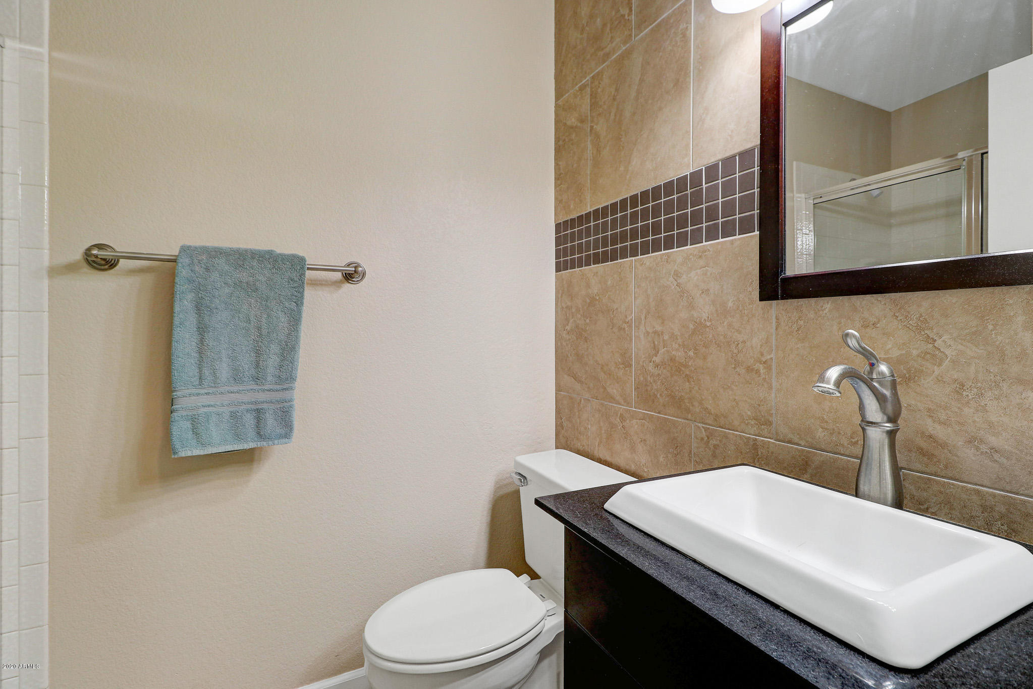 1902 East Redfield Road Phoenix, AZ 85022 - Photo 20 of 31 a bathroom with a sink toilet and mirror