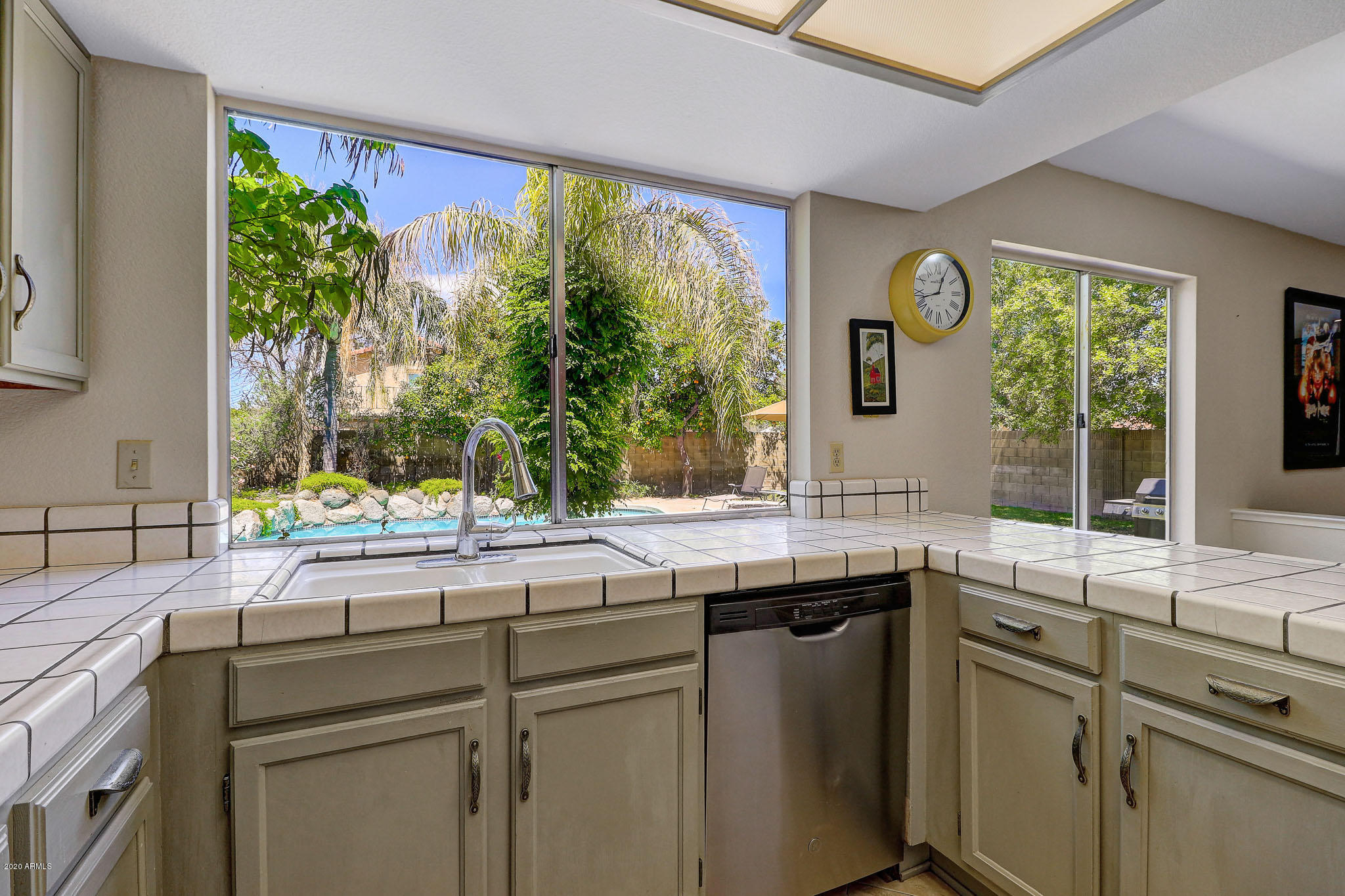 1902 East Redfield Road Phoenix, AZ 85022 - Photo 2 of 31 a kitchen with a sink and large window