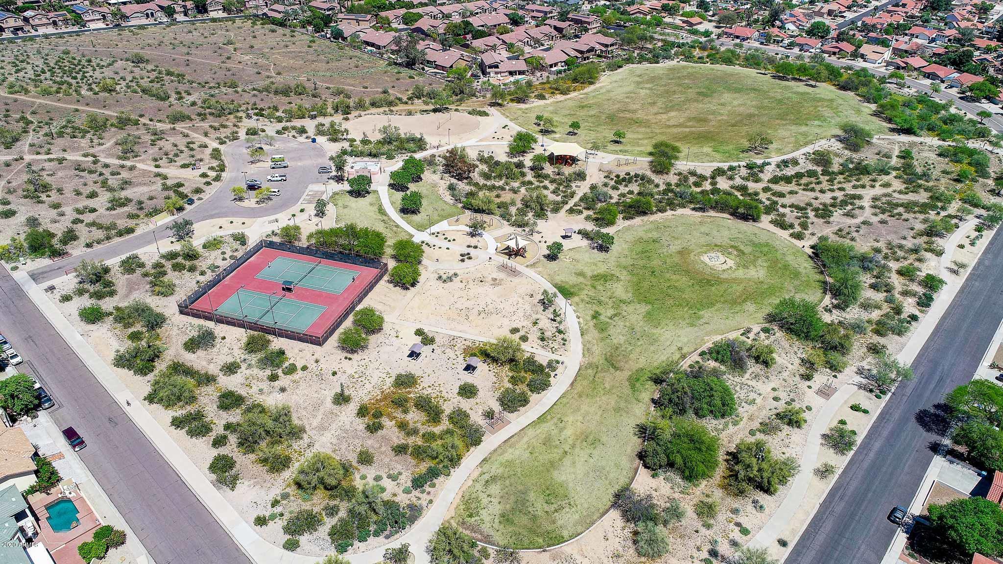 1902 East Redfield Road Phoenix, AZ 85022 - Photo 29 of 31 an aerial view of a house a yard and mountain view in back