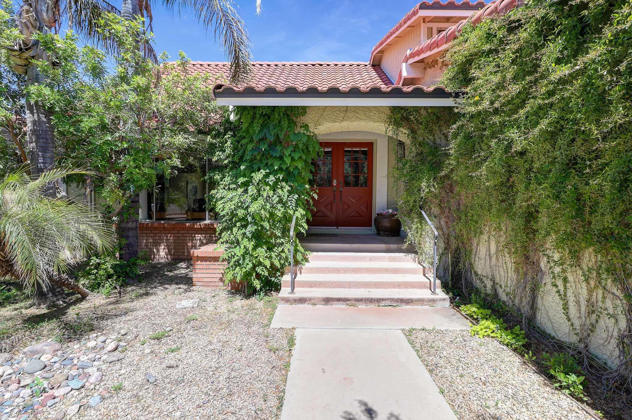 1902 East Redfield Road Phoenix, AZ 85022 - Photo 31 of 31 a front view of a house with plants