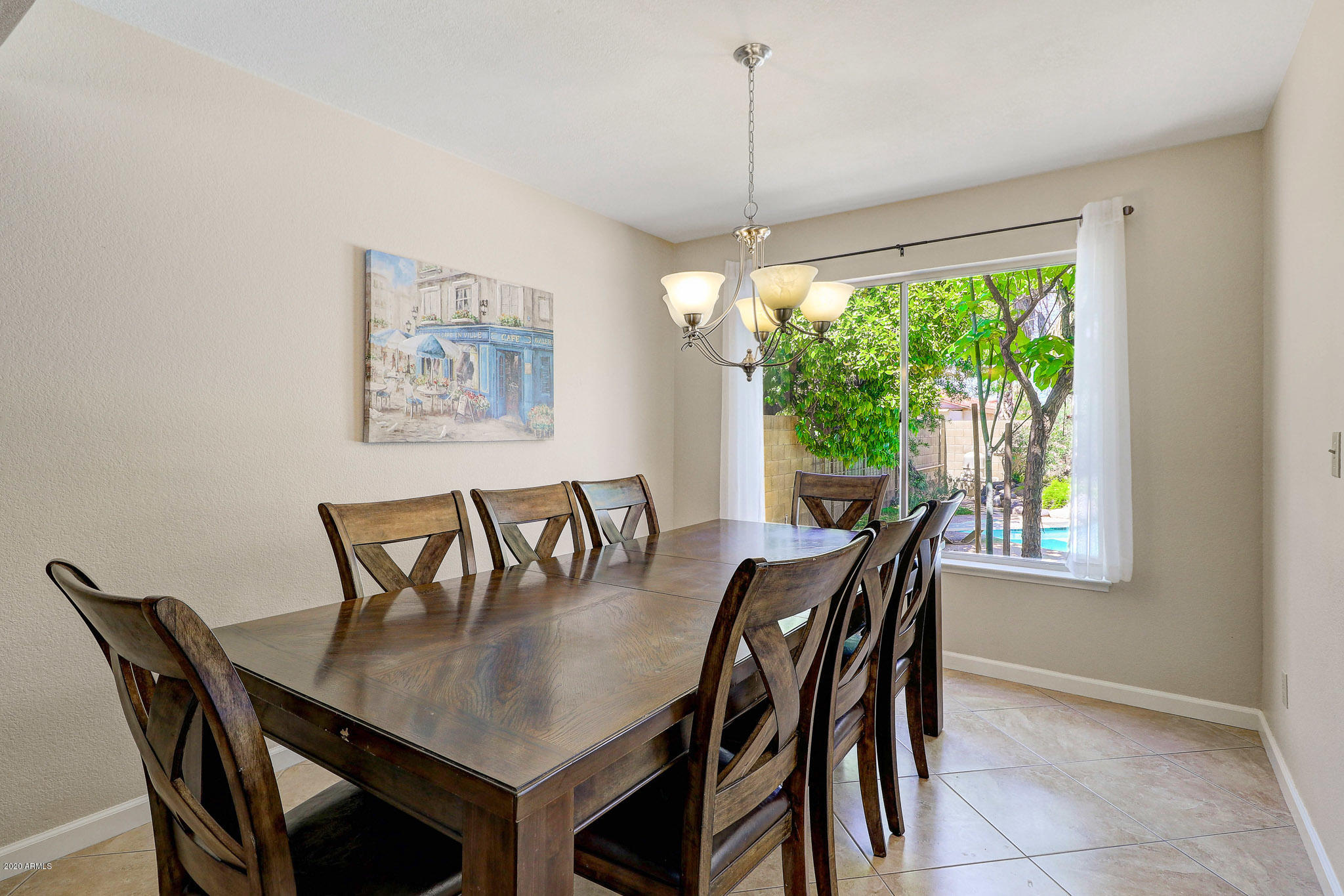 1902 East Redfield Road Phoenix, AZ 85022 - Photo 7 of 31 a view of a dining room with furniture window and outside view