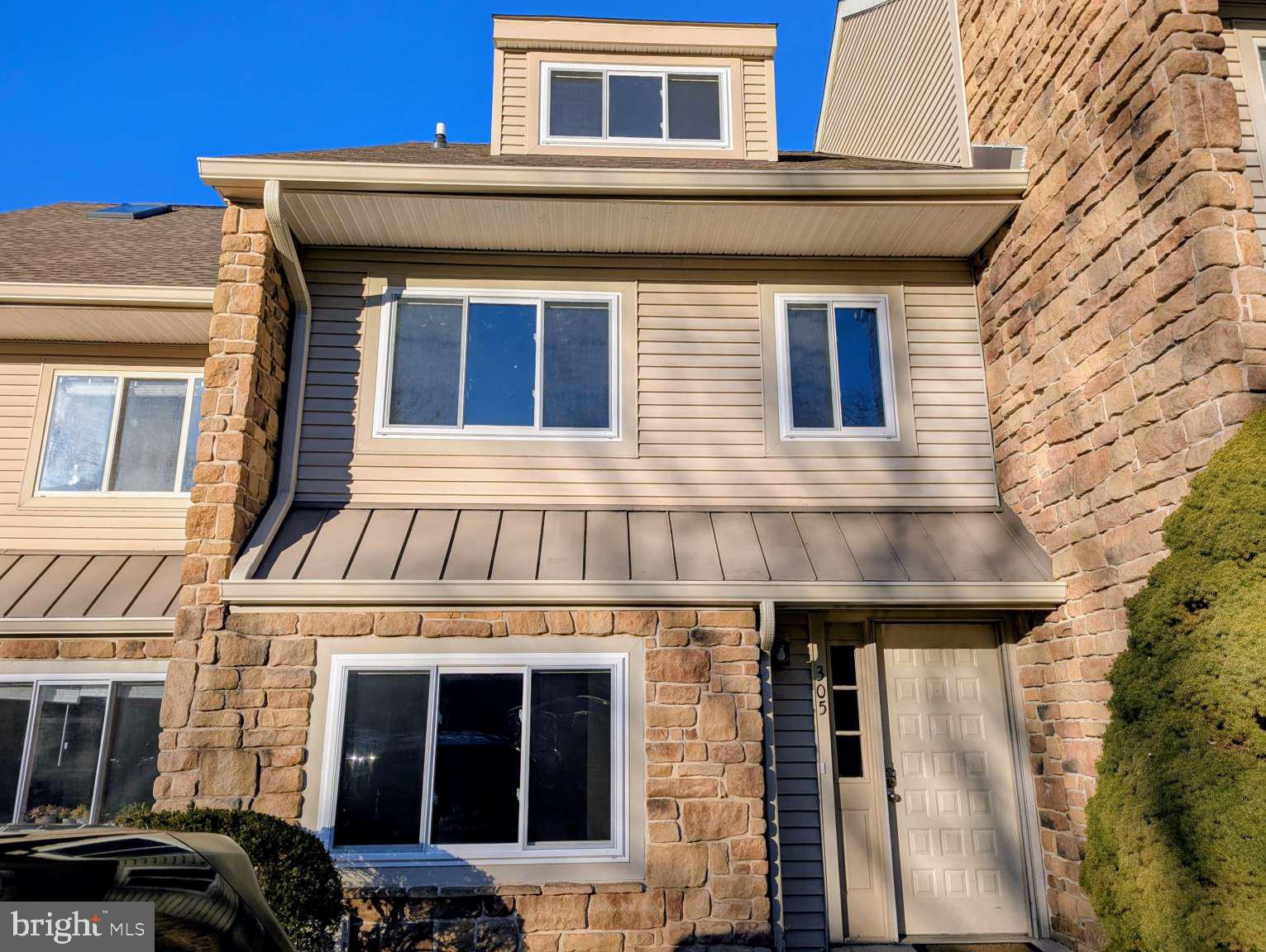 a view of a house with a large windows