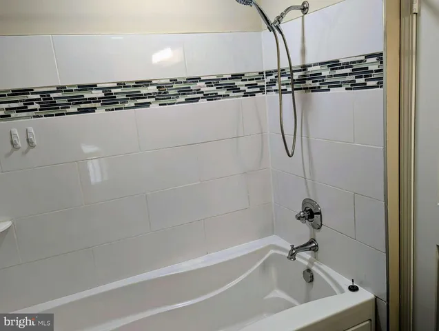a bathroom with a bathtub