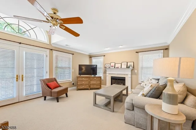 a spacious bathroom with a shower sink and mirror