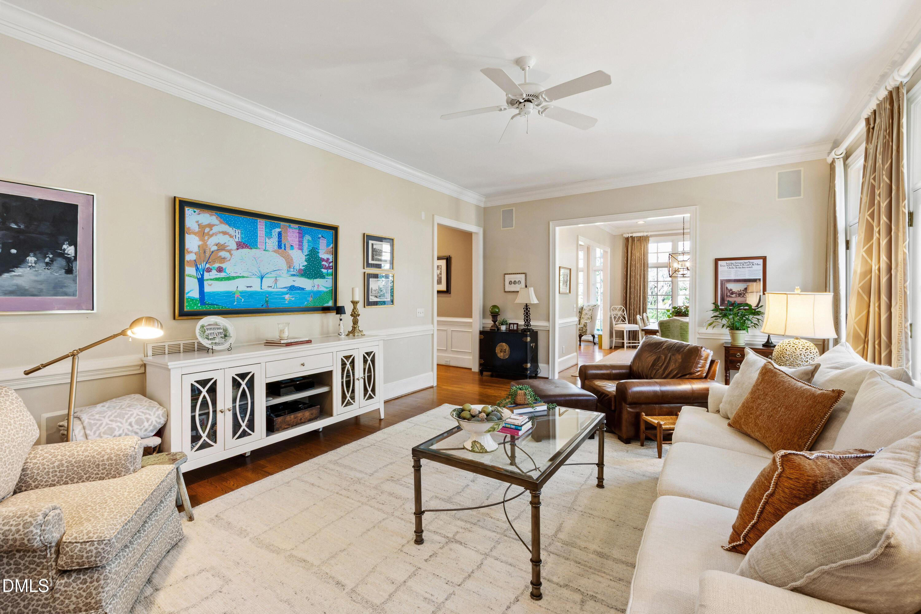 2536 Wake Drive Raleigh, NC 27608 - Photo 25 of 74 a living room with furniture and a flat screen tv
