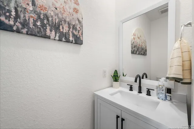 a view of a balcony with furniture