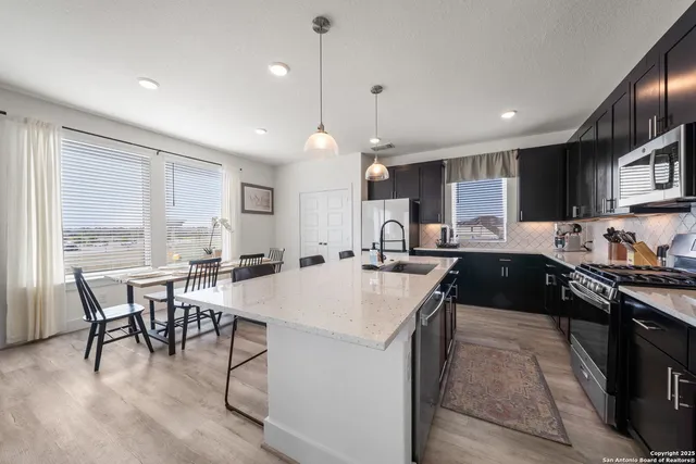 a kitchen with counter space and center island