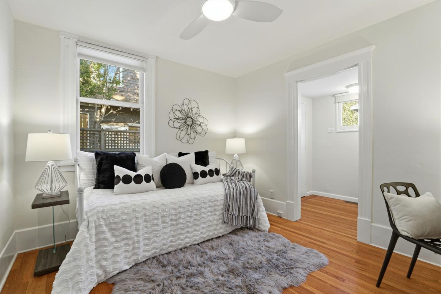 813 Cowper Street Palo Alto, CA 94301 - Photo 12 of 25 a living room with furniture and wooden floor