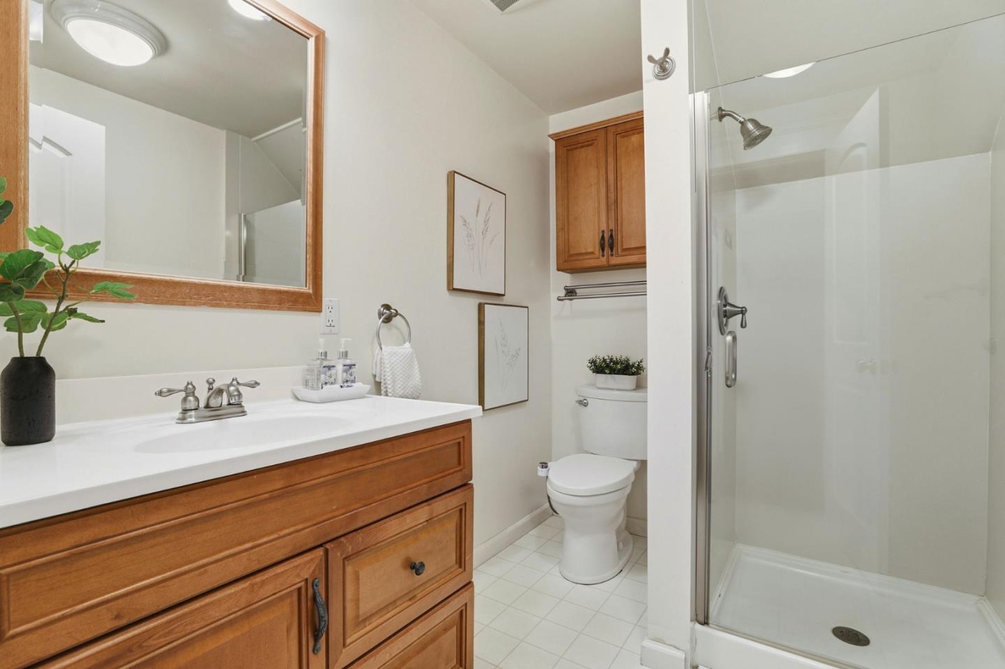 813 Cowper Street Palo Alto, CA 94301 - Photo 14 of 25 a bathroom with a sink a toilet and shower