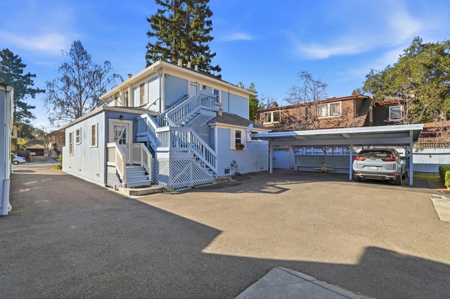 813 Cowper Street Palo Alto, CA 94301 - Photo 20 of 25 a front view of a house with yard