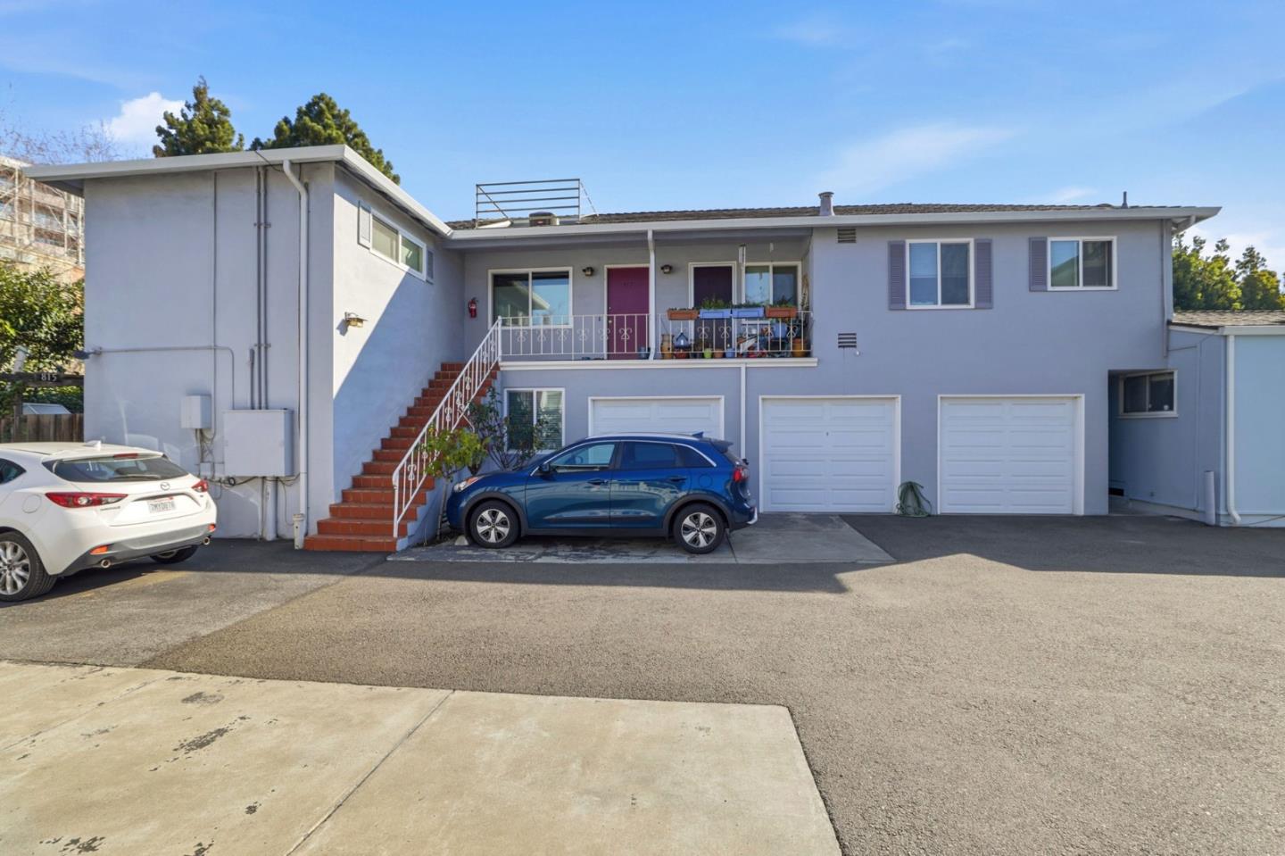 813 Cowper Street Palo Alto, CA 94301 - Photo 21 of 25 a car parked in front of a house