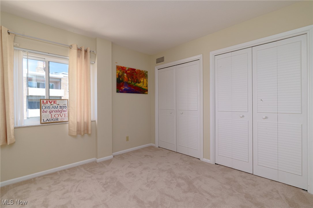 2089 Wooster Road, Unit C42 Rocky River, OH 44116 - Photo 19 of 43 Second bedroom has newer carpeting, vinyl windows and double closets