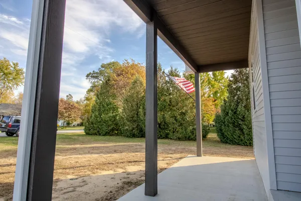 a view of wooden floor with a lake