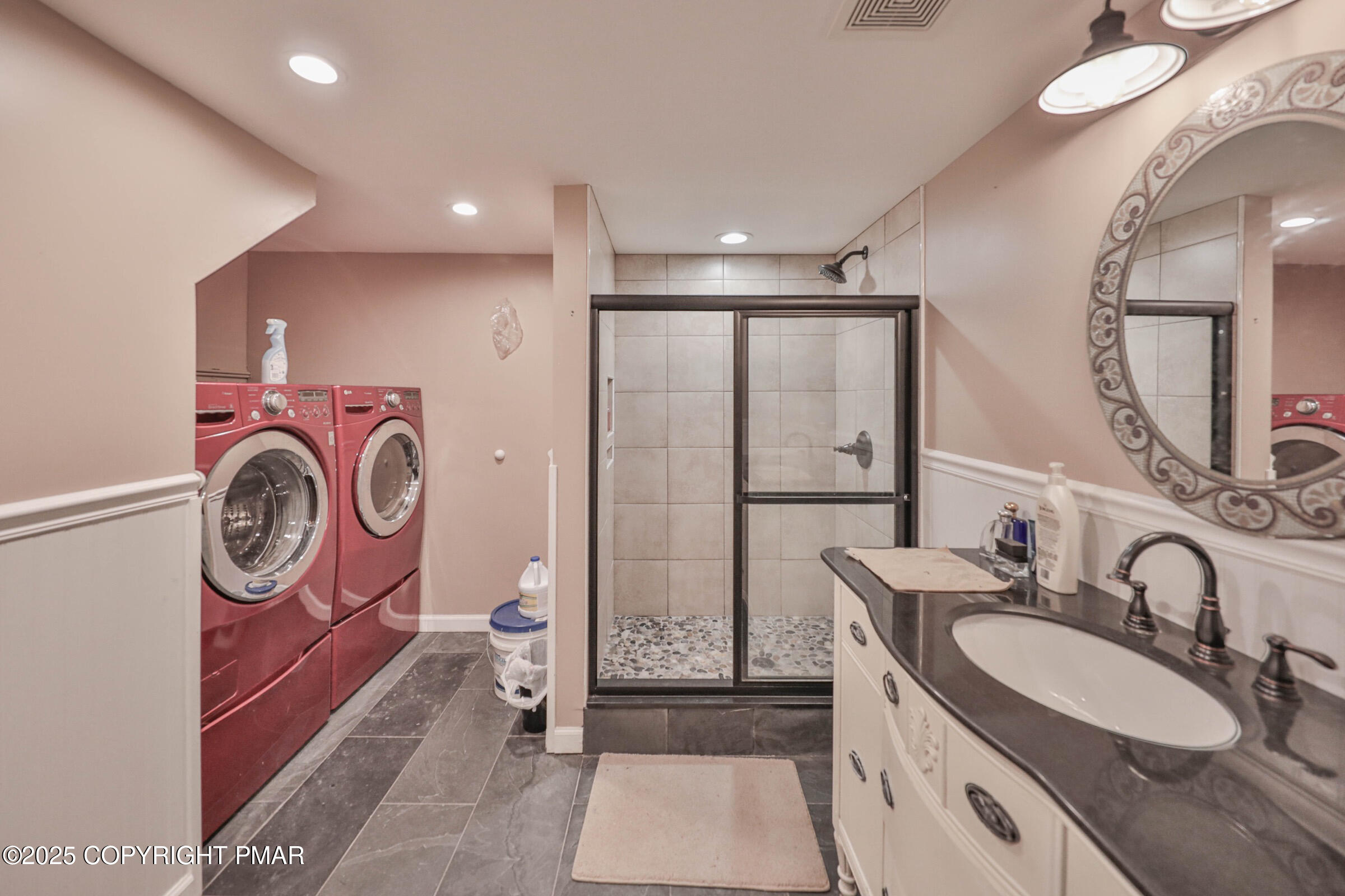 1094 Maple Lake Drive Bushkill, PA 18324 - Photo 54 of 81 a bathroom with a double vanity sink mirror and double